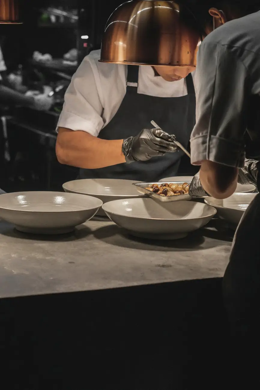 Professional chefs working together in a kitchen